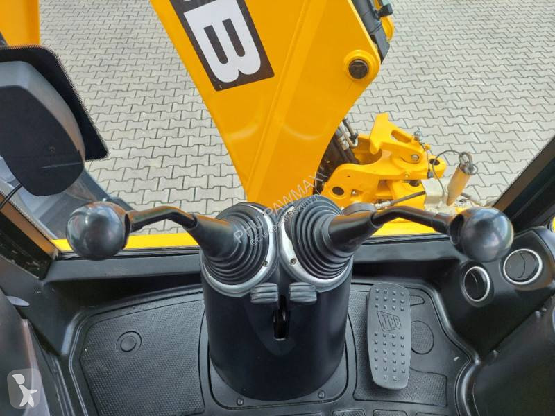 Traktor med grab JCB