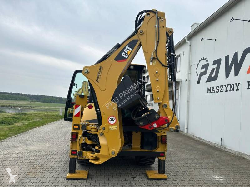 لودر حفار Caterpillar 2