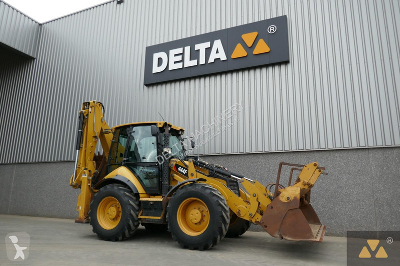 Traktor med grab Caterpillar 444F