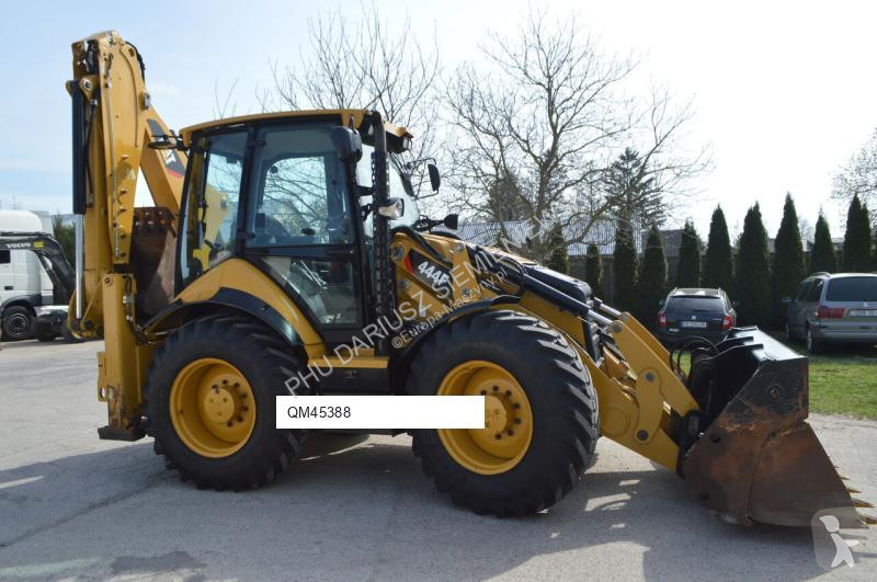 Traktor med grab Caterpillar 444F