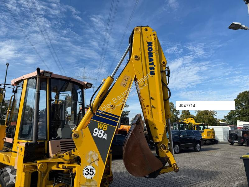 Traktor med grab Komatsu