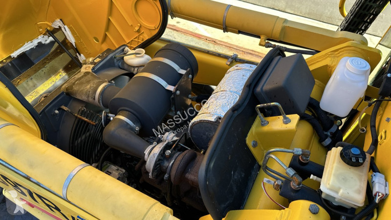 Traktor med grab Komatsu