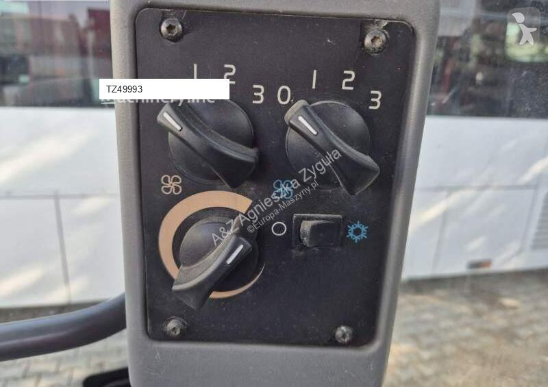 Traktor med grab Volvo