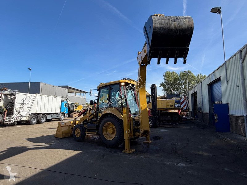 Экскаватор-погрузчик Caterpillar 424 Backhoe...