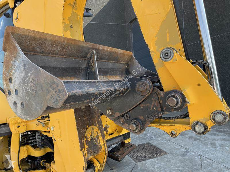Traktor med grab Caterpillar