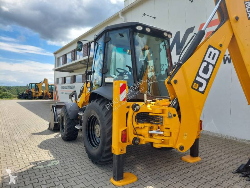 Traktor med grab JCB