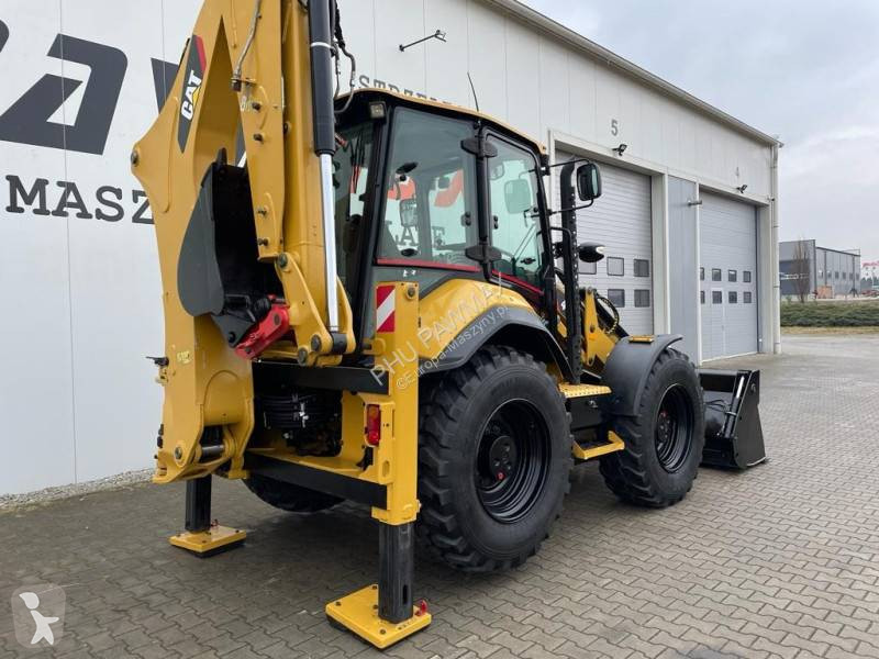 Traktor med grab Caterpillar 444 F2