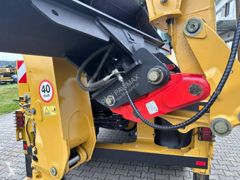 لودر حفار Caterpillar 2