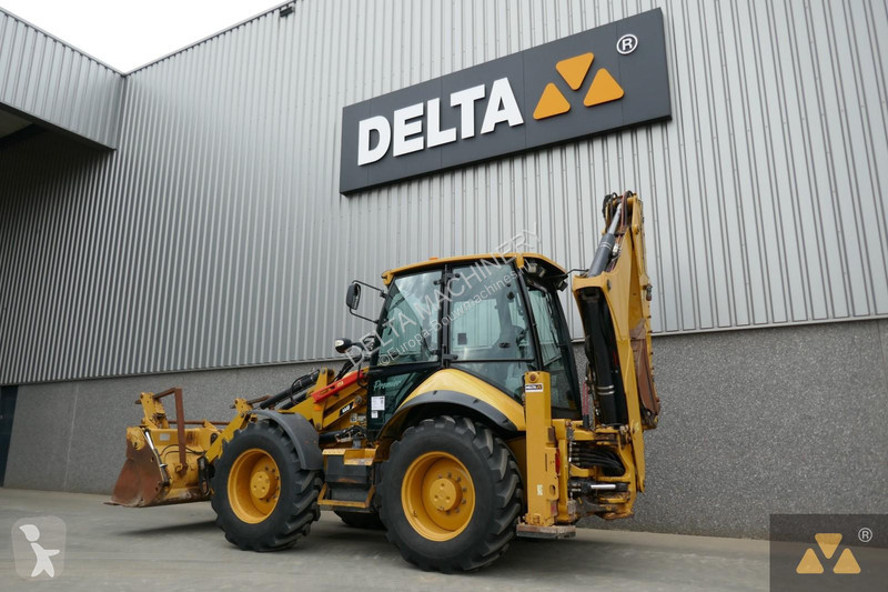 Traktor med grab Caterpillar 444F