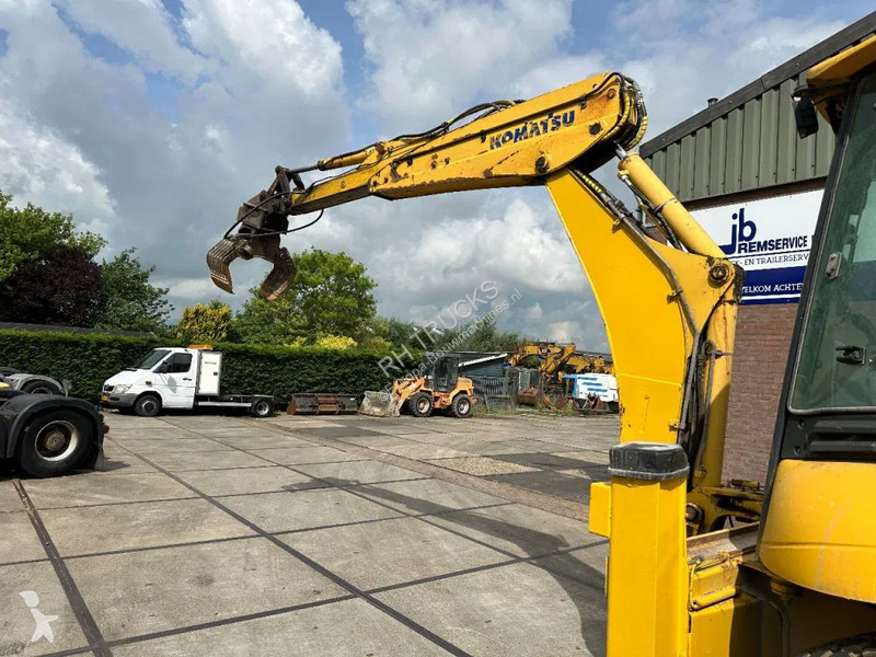Traktor med grab Komatsu E0