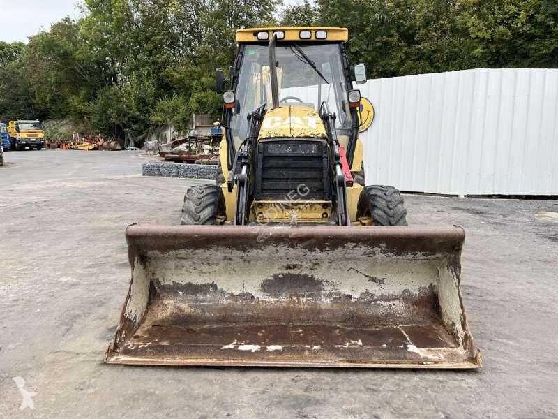 Traktor med grab Caterpillar