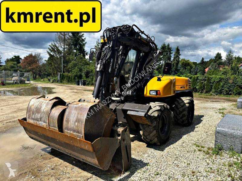 Buldoexcavator Mecalac 12 MTX koparko-ładowarka...