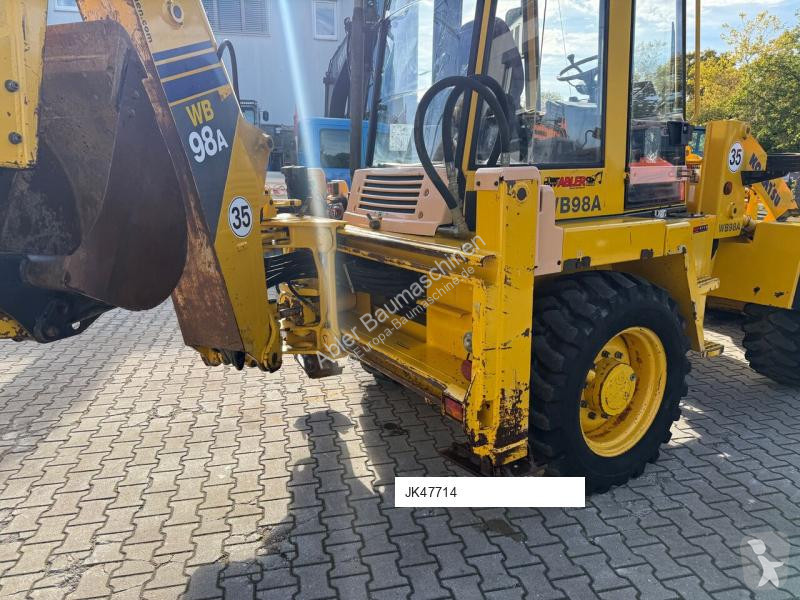 Traktor med grab Komatsu
