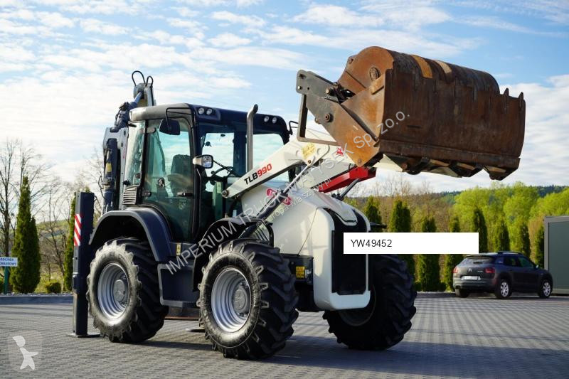 Traktor med grab Terex TLB 990