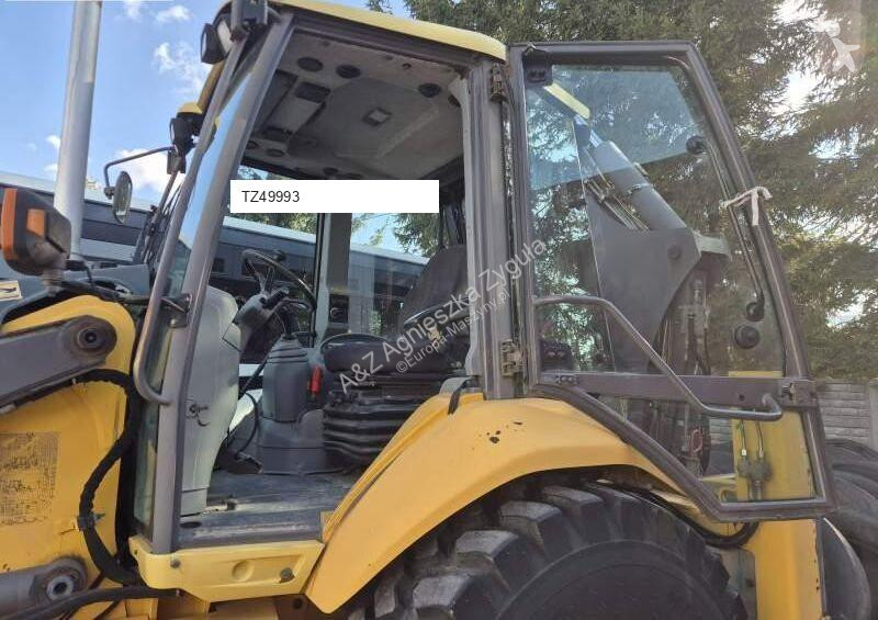 Traktor med grab Volvo
