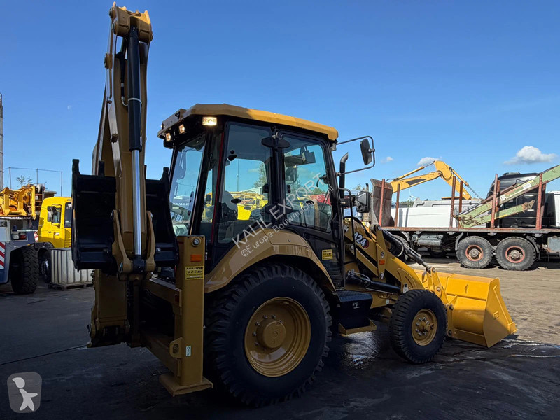 Экскаватор-погрузчик Caterpillar 424 Backhoe...