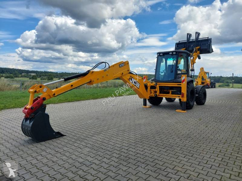 Traktor med grab JCB