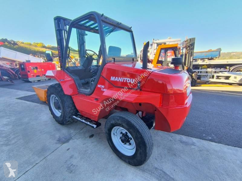 Terrængående gaffeltruck Manitou + Benne...