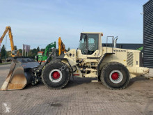 مُحمّلة Volvo L 180 F محملة بعجلات مستعمل