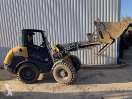 Mecalac ax700 drop + fourches used wheel loader