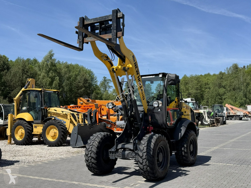Læssemaskine New Holland C Compact Widły +...