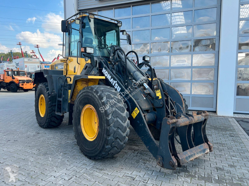 مُحمّلة Komatsu PT - 5H / 12.390h /