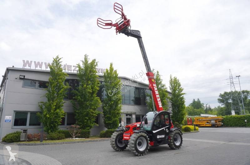 Încărcător telescopic Faresin-Haulotte 730C...