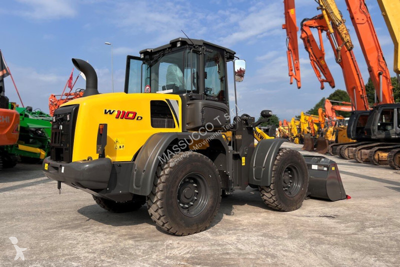 Фронтальный погрузчик New Holland D