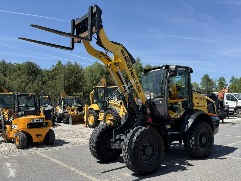 Læssemaskine New Holland C Compact Widły +...