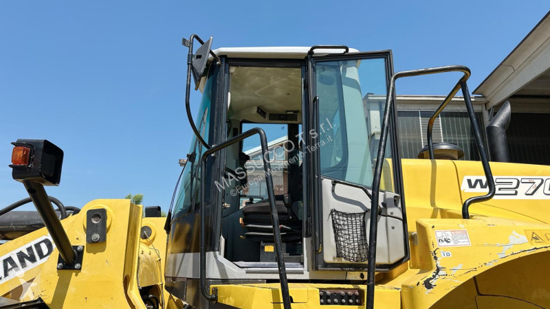 Фронтальный погрузчик New Holland