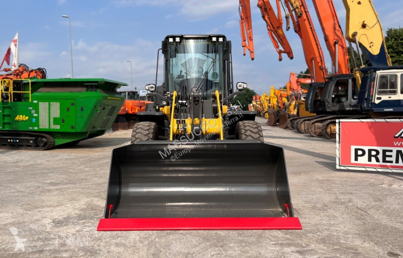 Фронтальный погрузчик New Holland D