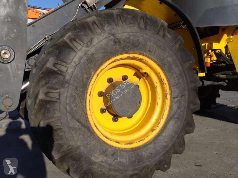 Фронтальный погрузчик New Holland TC