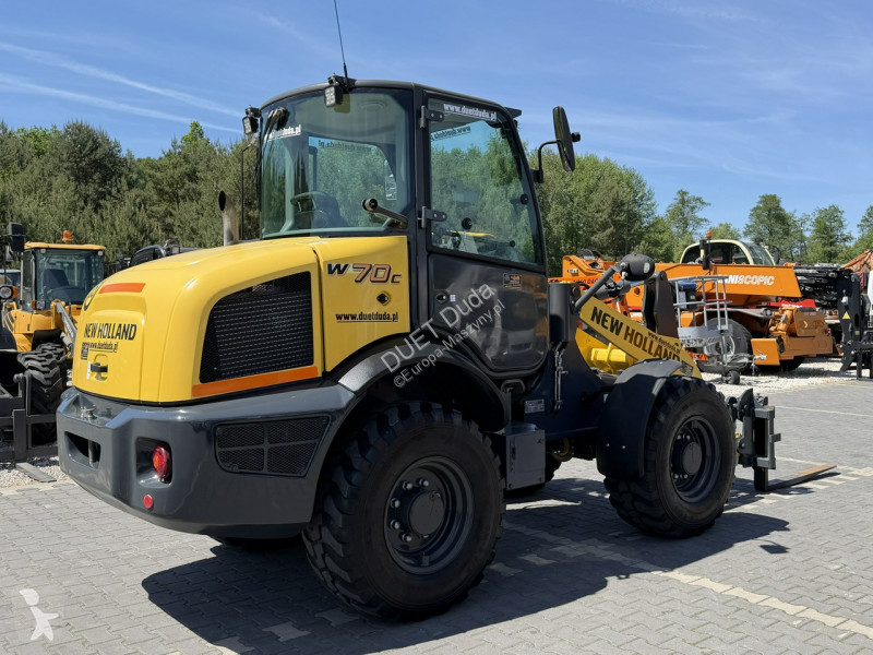 Læssemaskine New Holland C Compact Widły +...