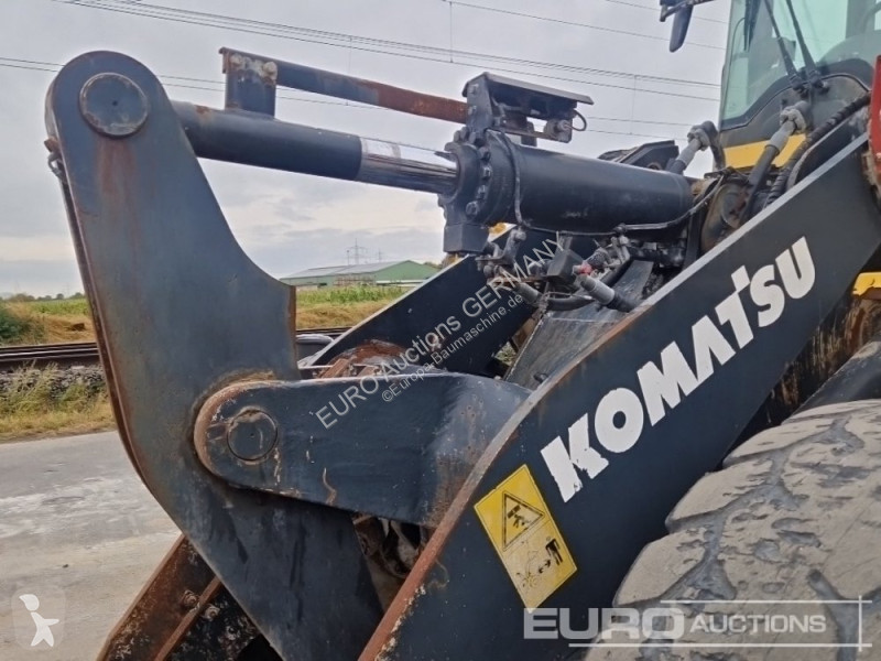 Incarcator Komatsu