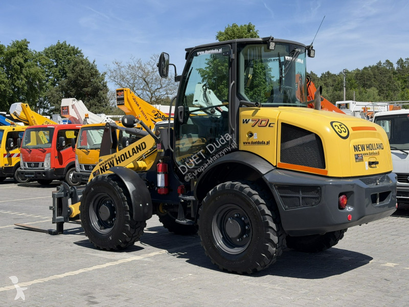 Læssemaskine New Holland C Compact Widły +...