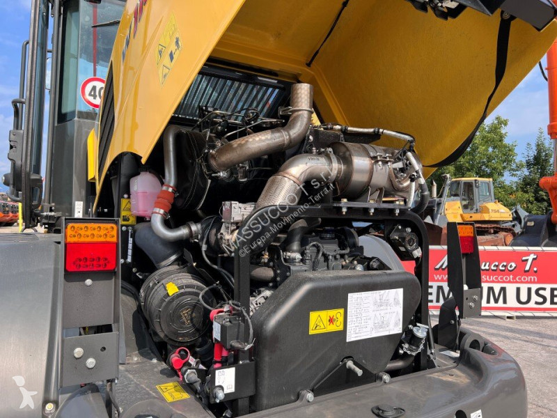Фронтальный погрузчик New Holland D