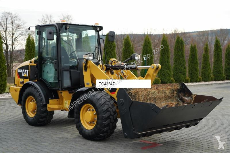 Nakladač Caterpillar 906M