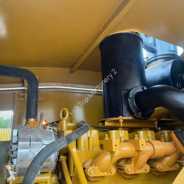 مُحمّلة Caterpillar Chargeuse sur pneus...