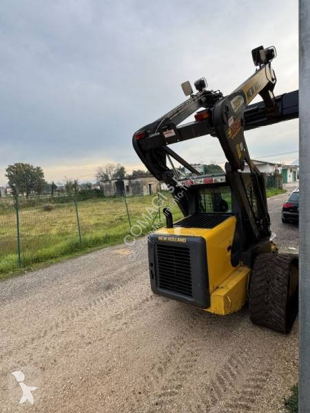 Фронтальный погрузчик New Holland C185 TURBO HF