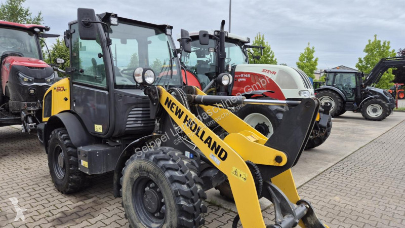 Фронтальный погрузчик New Holland C