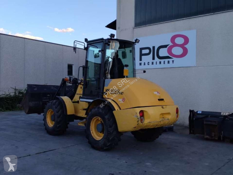 Фронтальный погрузчик New Holland TC