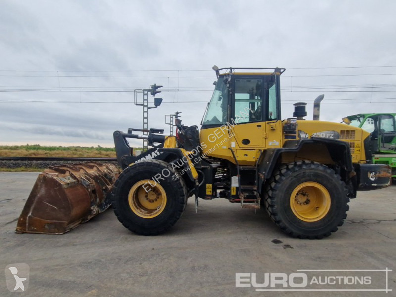 Incarcator Komatsu