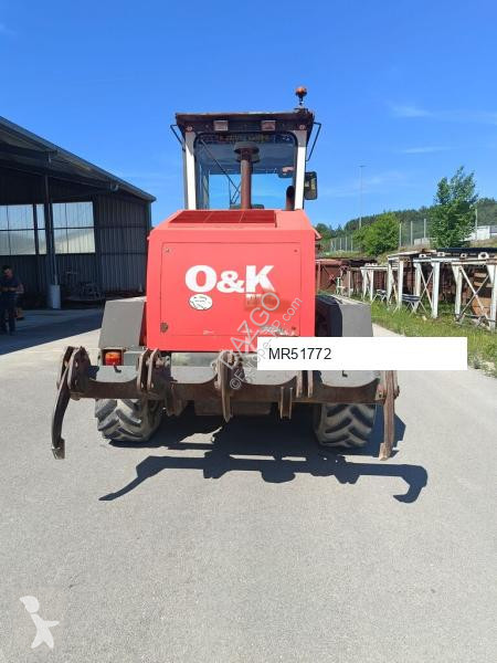 Грейдер O&K