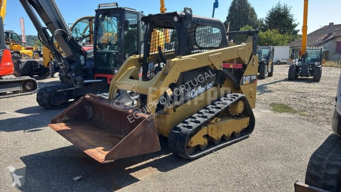 Pá carregadora escavadora com lagartas Caterpillar