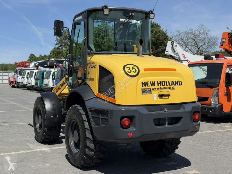 Læssemaskine New Holland C Compact Widły +...