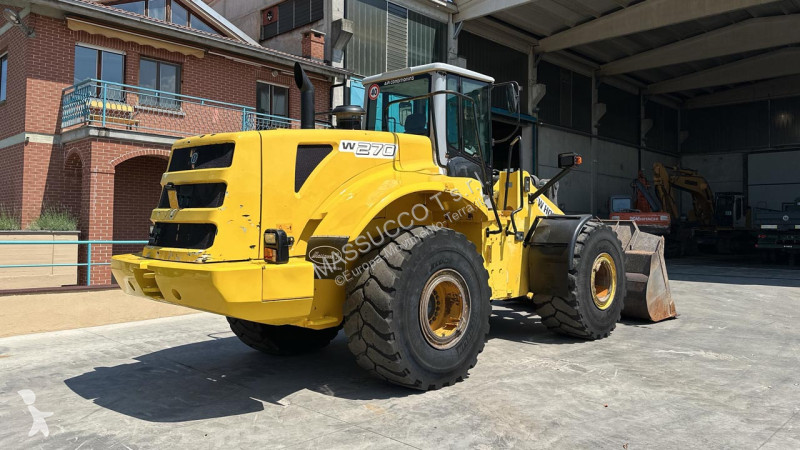 Фронтальный погрузчик New Holland
