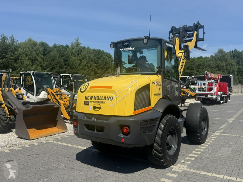 Læssemaskine New Holland C Compact Widły +...