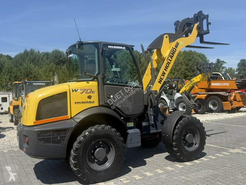 Læssemaskine New Holland C Compact Widły +...