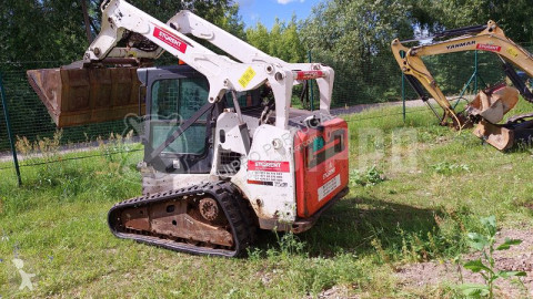 Pá carregadora escavadora com lagartas Bobcat