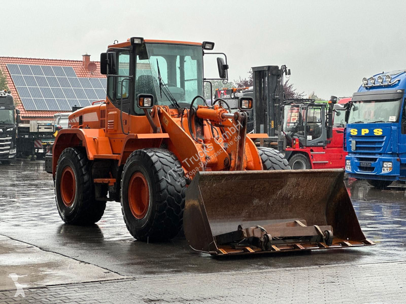 Навантажувач Doosan inkl. Schaufel & Gabel...
